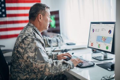 Soldier Using Computer – iStock-1157828024